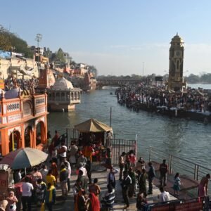 A vibrant scene at the Ganges Ghats in Haridwar during a Hindu festival, showcasing cultural richness.